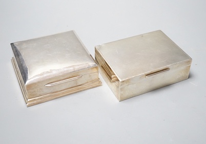 A George V silver mounted cigarette box, 11.5cm and a sterling cigarette box.